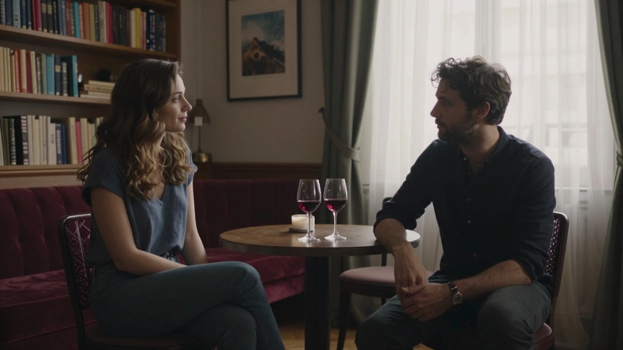 Two people sit respectfully across from each other in a quiet Paris apartment lounge.